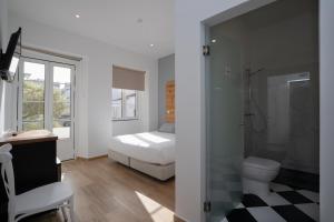 Alameda Guesthouse by Boutique Taipas Garagem para motos