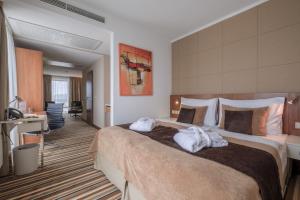 Junior Suite room in Business Hotel Astrum Laus