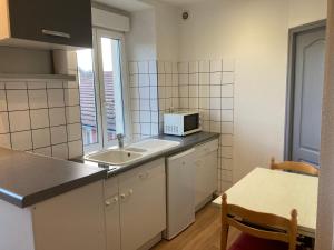 Appartements Studio fonctionnel, proche Techn-hom, IUT et UTBM : photos des chambres