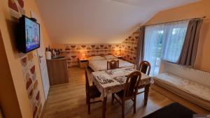 Pokoje Gościnne "Adam"