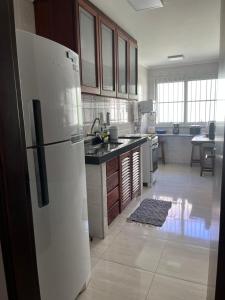 Cobertura 3 dormitórios, 2 vagas, churrasqueira, Wi-fi free, Lázaro Ubatuba