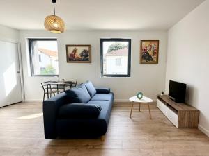 Appartements Les Arenes : photos des chambres