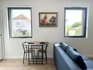 Appartements Les Arenes : photos des chambres