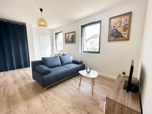 Appartements Les Arenes : photos des chambres