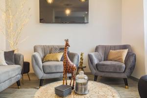 Appartements Le Flamboyant - Confort & Rarete - Premium : photos des chambres