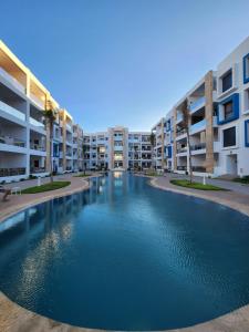 Appartement Familial Premium avec Climatisation Grande Terrasse vue Piscine