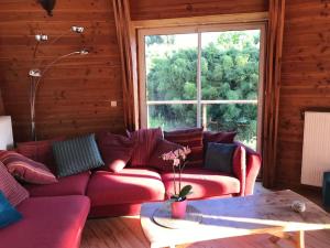 Maisons de vacances Maison ronde atypique en bois : photos des chambres