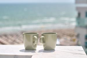 Infinity Breezes Apartment Beach Resort - parking