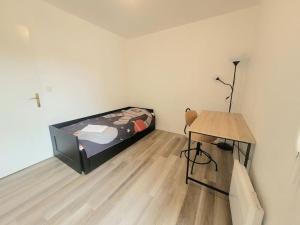 Appartements Appt T4 - Proche arret l-Europe avec PARKING : photos des chambres