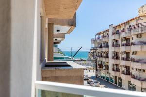 Varanda vista mar - 80m da praia - até 10 pessoas