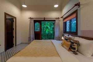 StayVista at Gulmohar Gardens with Gazebo, BBQ