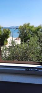 Beach apartment KATE with sea view, balcony and parking, MURTER, DALMATIA