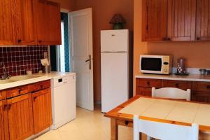 Appartements Mare e Monte , jardin mediterraneen et exotique. : photos des chambres