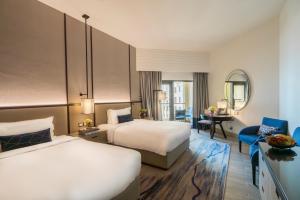 Sea View Room with Balcony - Twin Bed room in Amwaj Rotana Jumeirah Beach - Dubai