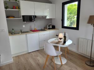 Appartements Agreable appart spacieux vu sur jardin : photos des chambres