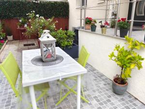 Maisons de vacances Maison Style Paris avec terrasse : photos des chambres