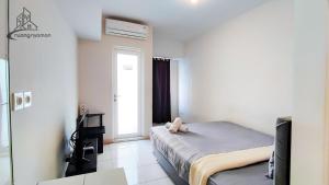 Springlake Summarecon Bekasi Apartement by RNA