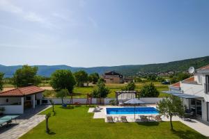 NEW Villa Anja is a 4 bedroom villa with a 32 sqm heated pool near Imotski 