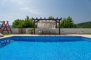 NEW Villa Anja is a 4 bedroom villa with a 32 sqm heated pool near Imotski 