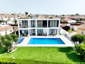 Luxury villa with large swimming pool and outdoor area