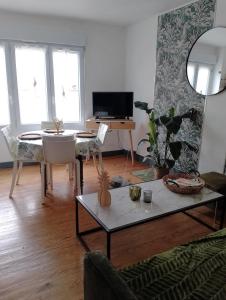 Appartements Le Rayon Vert : photos des chambres