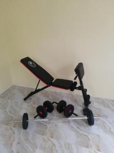 Bluewaves Apartment, scooter, car