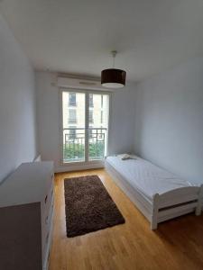 Appartements 3 pieces de 84 m2 avec terrasse - Paris sud : photos des chambres