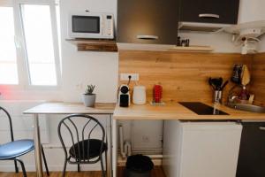 Appartements studio moderne proche Paris : photos des chambres