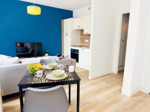 Appartements Cozy Apartment Lamarck : photos des chambres