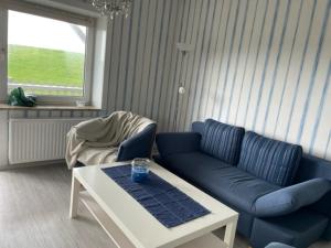 Wattnest - Ferienwohnung direkt in erster Meereslinie am Deich