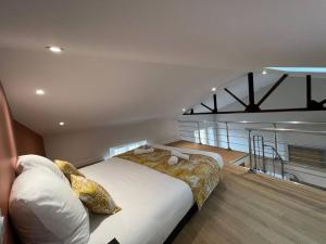 Appartements Duplex type Loft centre ville * clim * WIFI * Haut de gamme * : photos des chambres