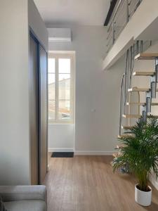 Appartements Duplex type Loft centre ville * clim * WIFI * Haut de gamme * : photos des chambres