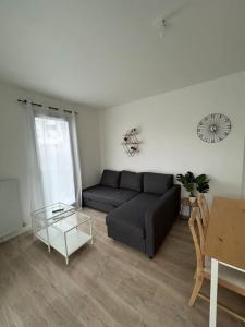 Appartements Appartement cosy avec jardin : photos des chambres