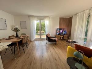 Appartements T2 Spacieux avec jardin privatif : photos des chambres