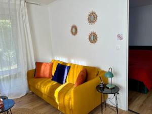 Appartements T2 Spacieux avec jardin privatif : photos des chambres