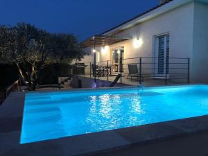 Maisons de vacances Villa Coquelicot avec piscine chauffee et borne electrique : photos des chambres