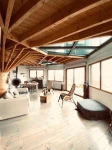 Maisons de vacances Superbe maison design en bois vue Mer : photos des chambres