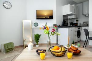 Appartements Studio cosy a 15 min de Paris : photos des chambres