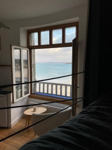 Appartements Le Petit Saint Cast - Cocon vue Mer : photos des chambres