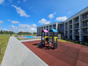 Mindaugo apartamentai su šildomu baseinu, sporto sale, vaikų kambariu, work zona