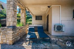 Villas Belle Villa avec Superbe vue, Piscine et Jacuzzi : photos des chambres
