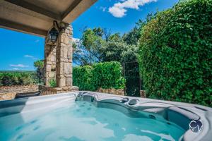 Villas Belle Villa avec Superbe vue, Piscine et Jacuzzi : photos des chambres