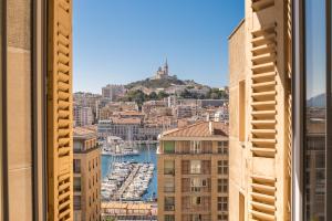 Appartements Splendide vue sur ND de la Garde et le Vieux Port : photos des chambres