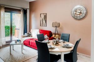 Appartements Appartement moderne central avec piscine, garage prive et terrasse sud : photos des chambres