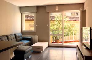 Appartements Appartement Le Saint-Etienne avec Terrasse : photos des chambres