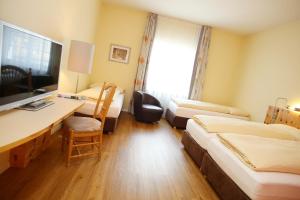 Quadruple Room room in Ambiente Hotel Freieck AG