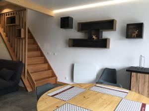 Appartements Les Piroulards : photos des chambres