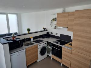 Maisons de vacances Maisonnette cosy : photos des chambres