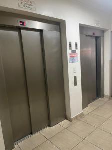 Aconchego Guarujá - AP 42