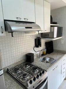 Aconchegante Pitangueiras - Ap. 1312